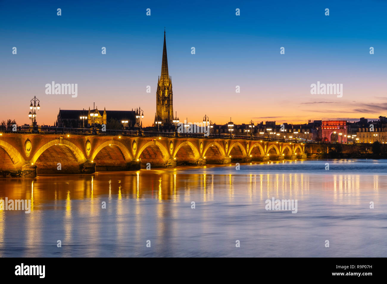 Pont de Pierre at dusk. Stone Bridge & Garonne River. Bordeaux, Gironde