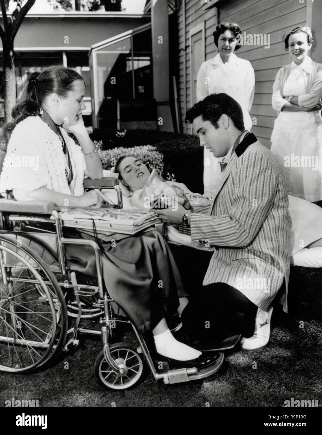 Elvis Presley,  visits sick children at a hospital, 1958   File Reference # 33635 753THA Stock Photo