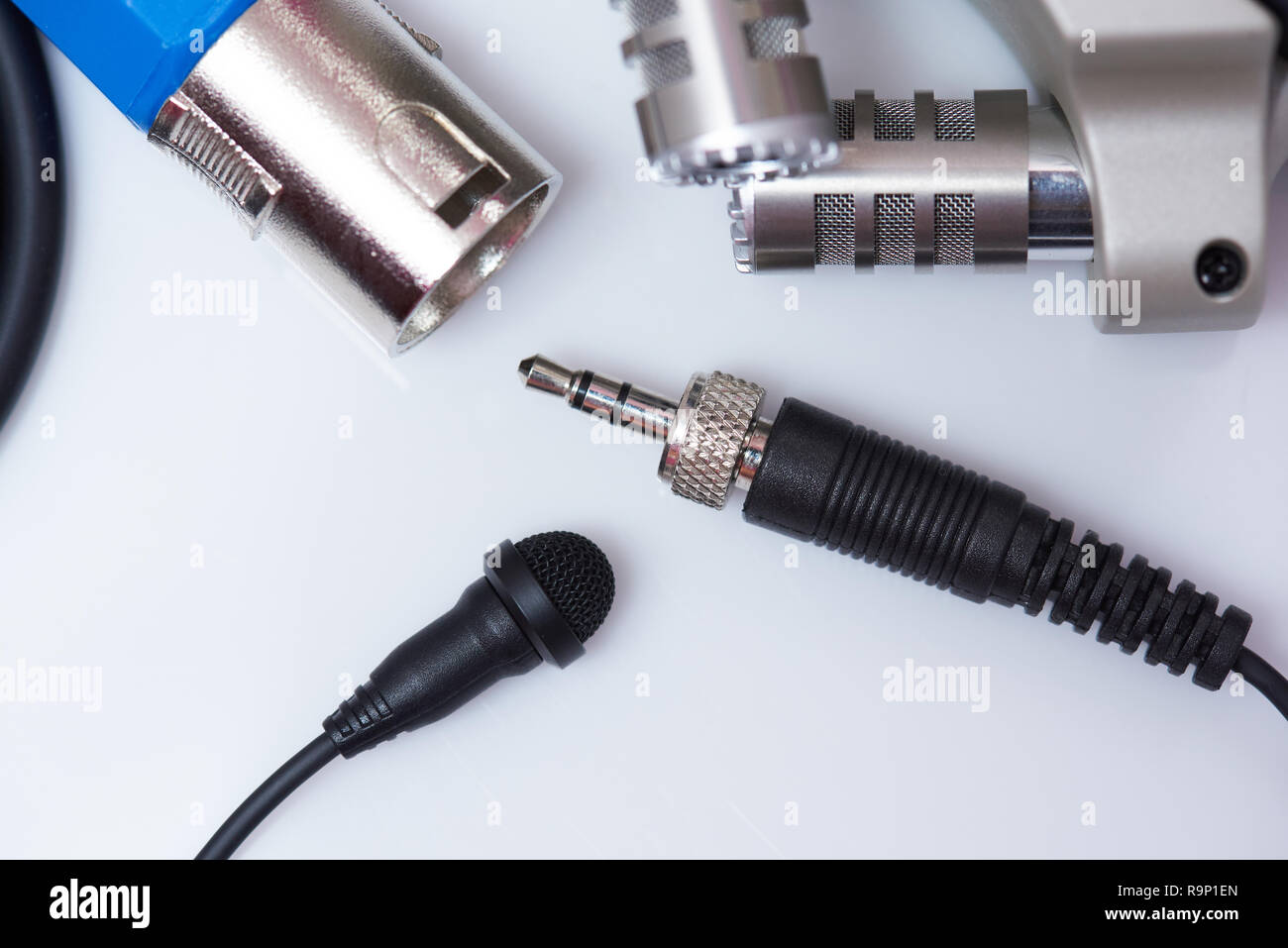 Lavalier microphone with audio plug close up view on white background Stock Photo