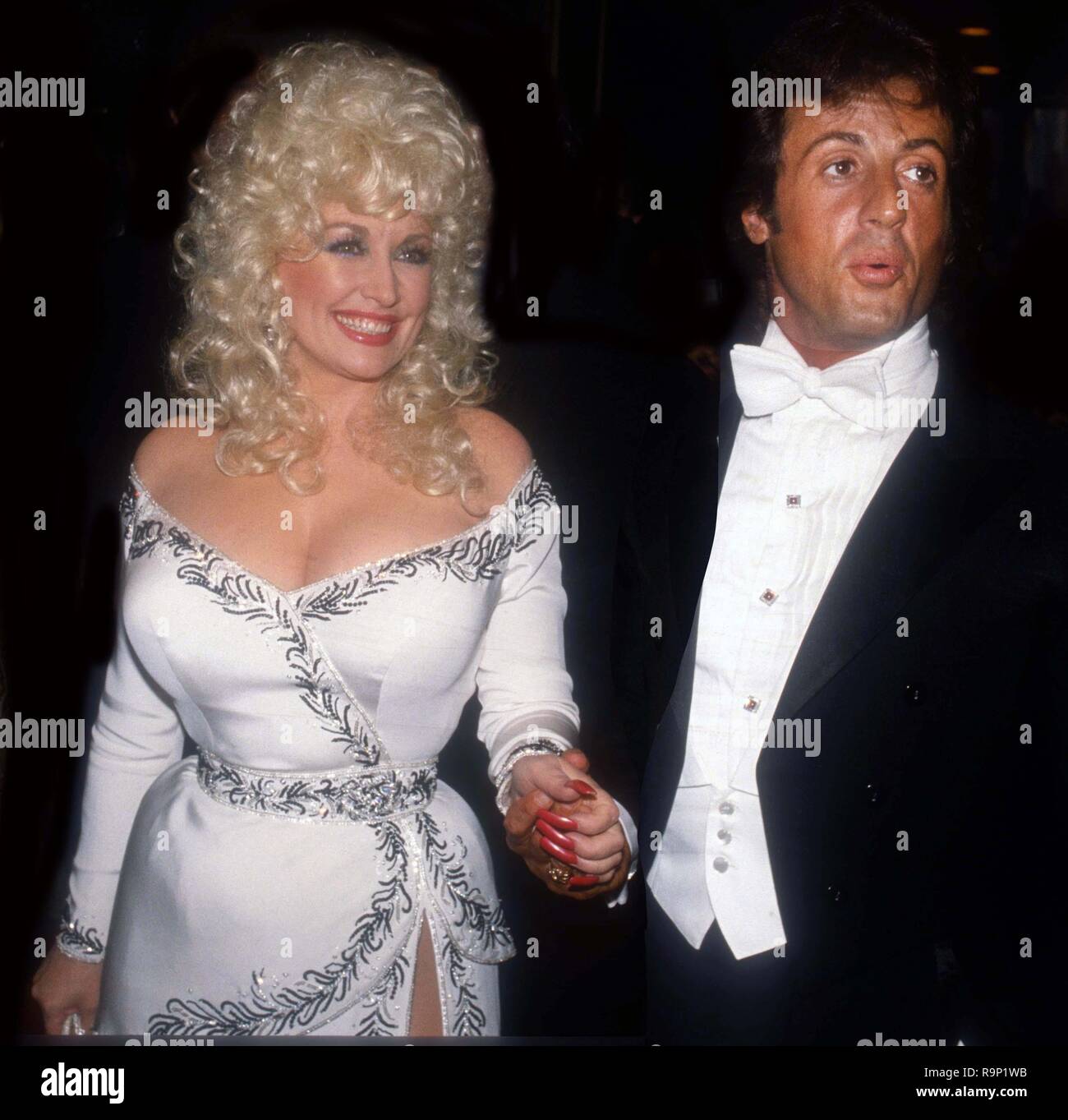 Dolly Parton Sylvester Stallone 1984 Photo By John Barrett/PHOTOlink