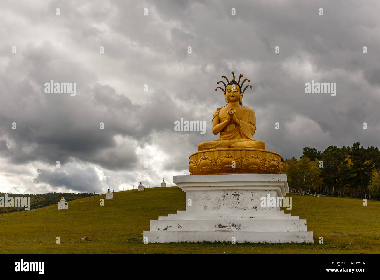 statue of buddha sitting in the lotus position in Mongolian temple