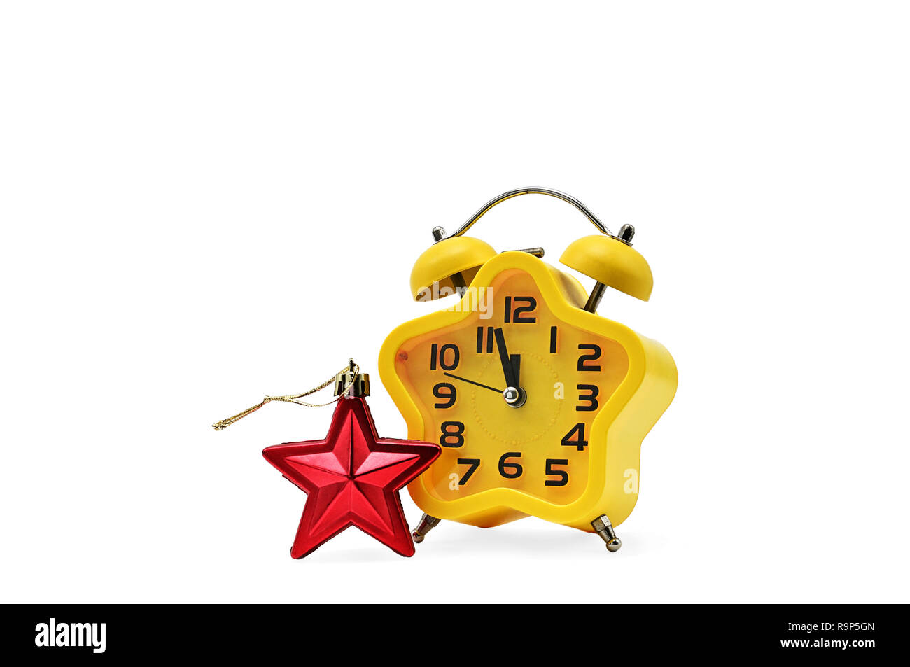 An asterisk Christmas clock shows the remaining time until midnight with a red asterisk,on an isolated white background.Yellow.12,Twelve o'clock Stock Photo