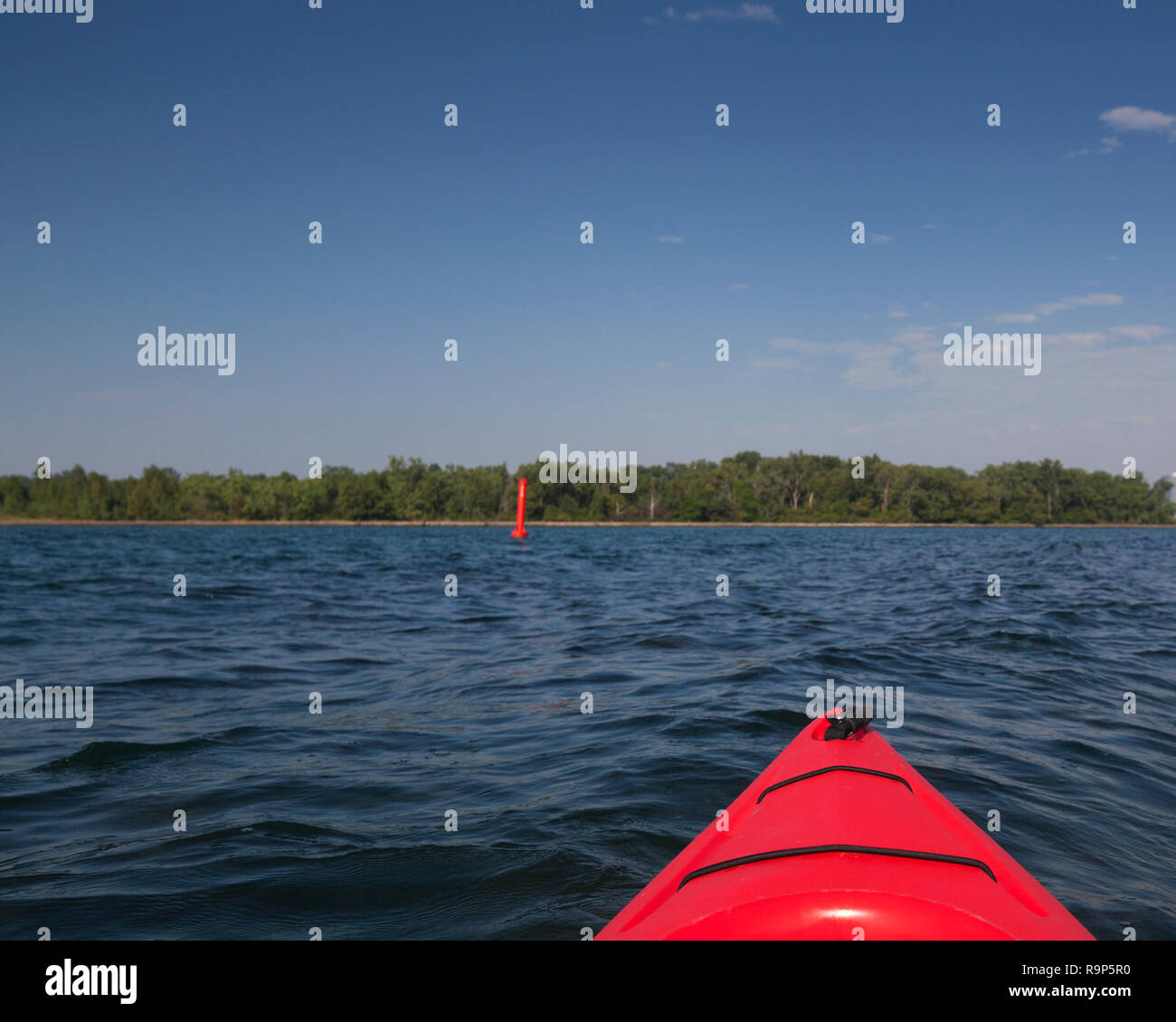 Kayak and marker in Lake Ontario at Cherry Beach in Toronto Canada. Stock Photo