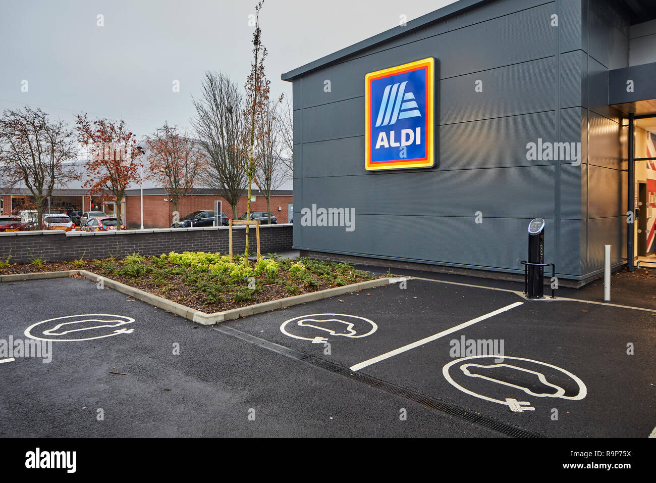 Electric car charging parking bays in the carpark of ALDI supermarket Glasshoughton Castleford  West Yorkshire, England Stock Photo