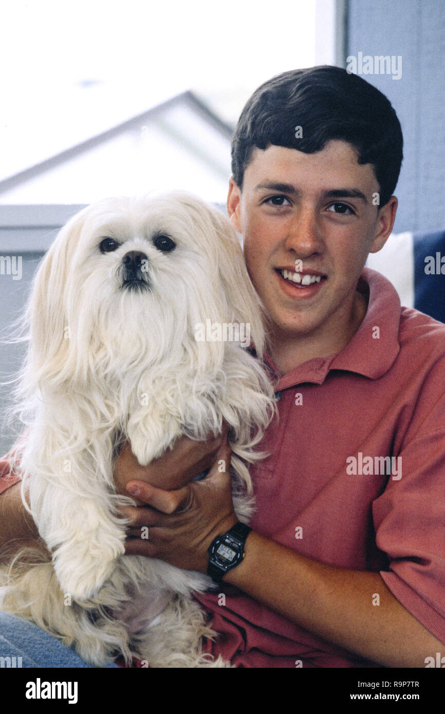 15 Year Old Boy with His Pet Dog, USA Stock Photo