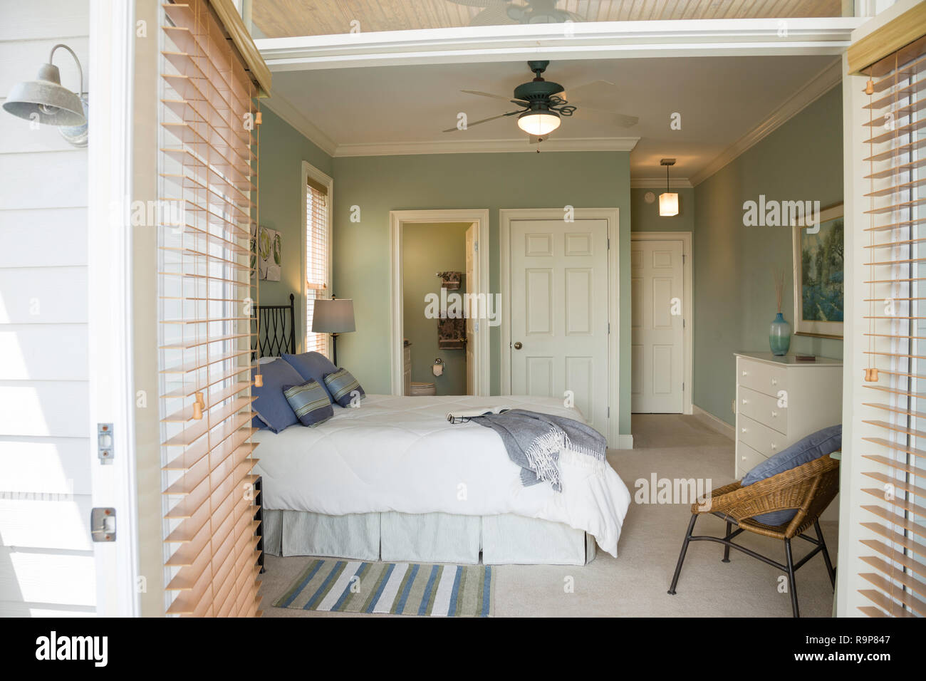 Looking Into Comfortable Bedroom Through Open Doors South