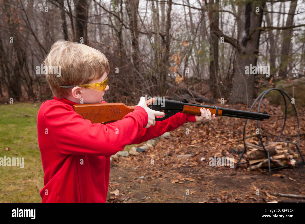 Young boy learning gun safety, USA Stock Photo Alamy