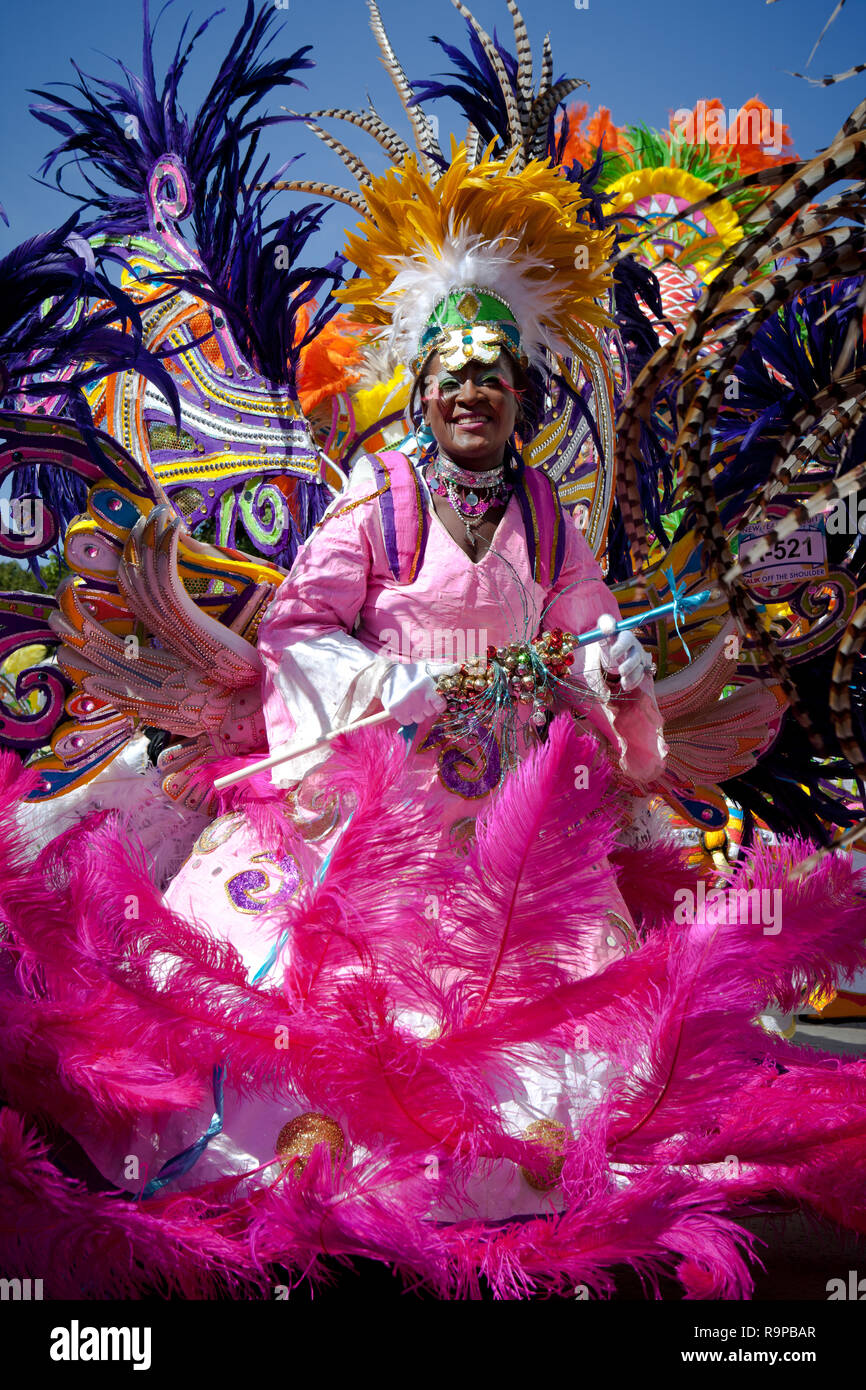 NASSAU, THE BAHAMAS - JANUARY 1 - Female troop leader dances in Junkanoo, a cultural festival in Nassasu in Jan 1, 2011.   Stock Photo