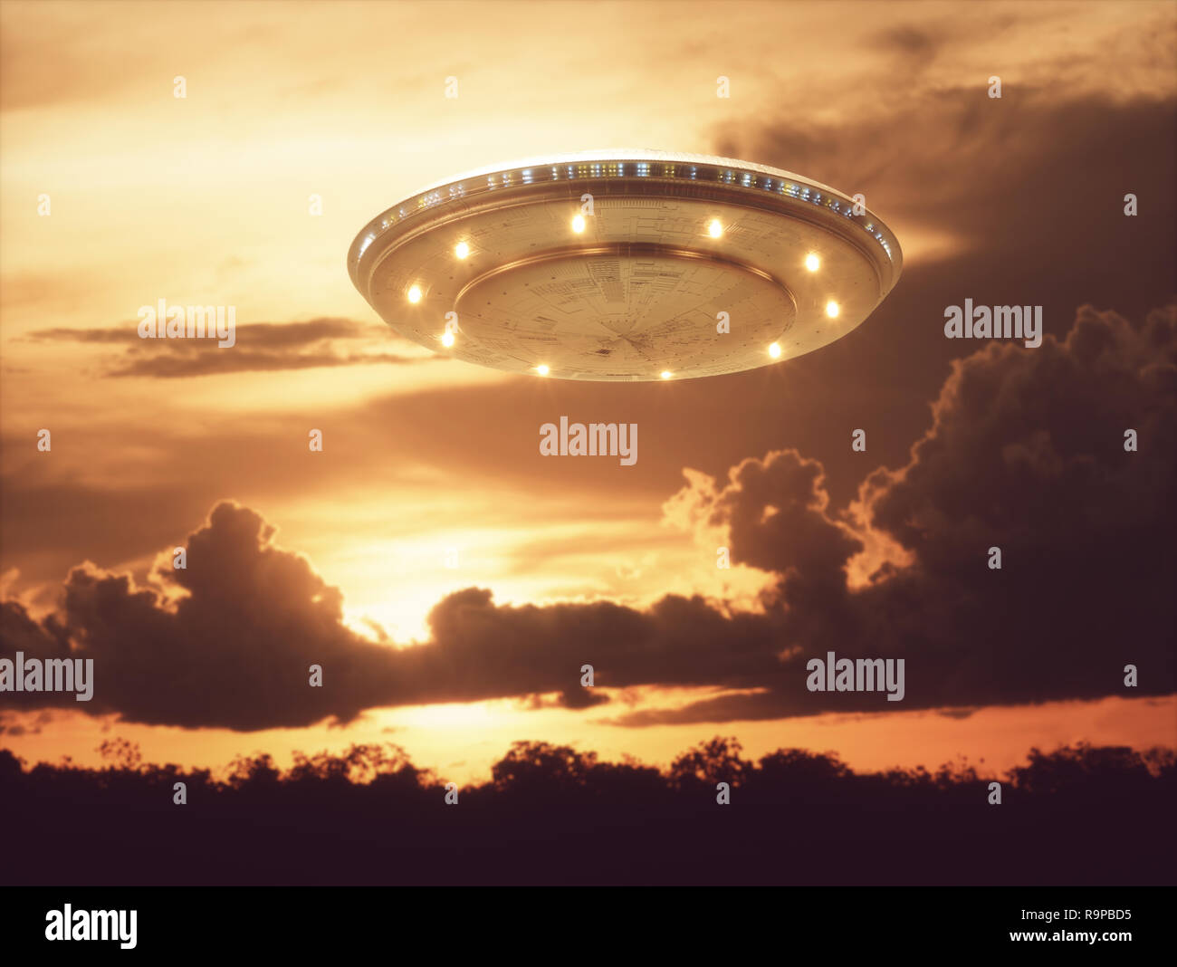 Unidentified flying object, UFO with the sunset in the background. Stock Photo