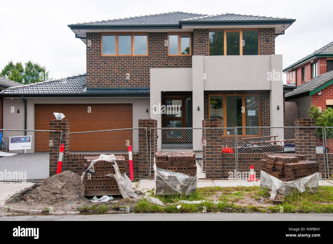 Newly-built suburban family home, awaiting a final clean up. Caulfield, Melbourne, Australia. New home completions are an economic indicator. Stock Photo