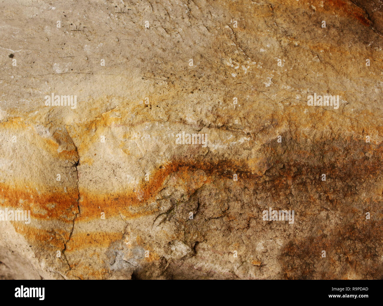 Wall of an ancient cave Stock Photo
