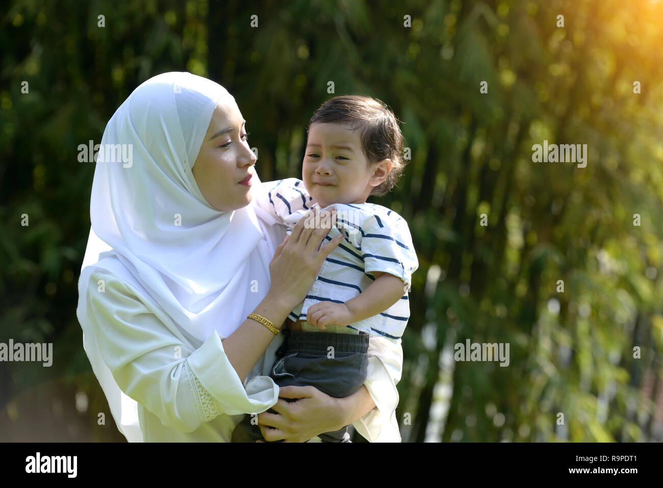 Malay Muslim Mother And Boy Throwing Tantrum Stock Photo Alamy