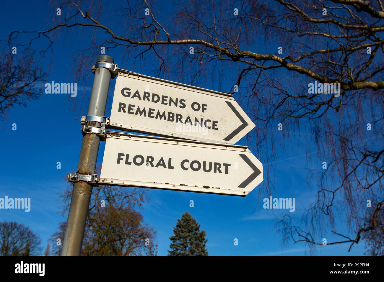 Close up of Floral court and Gardens of remembrance signs in cemetery UK Stock Photo