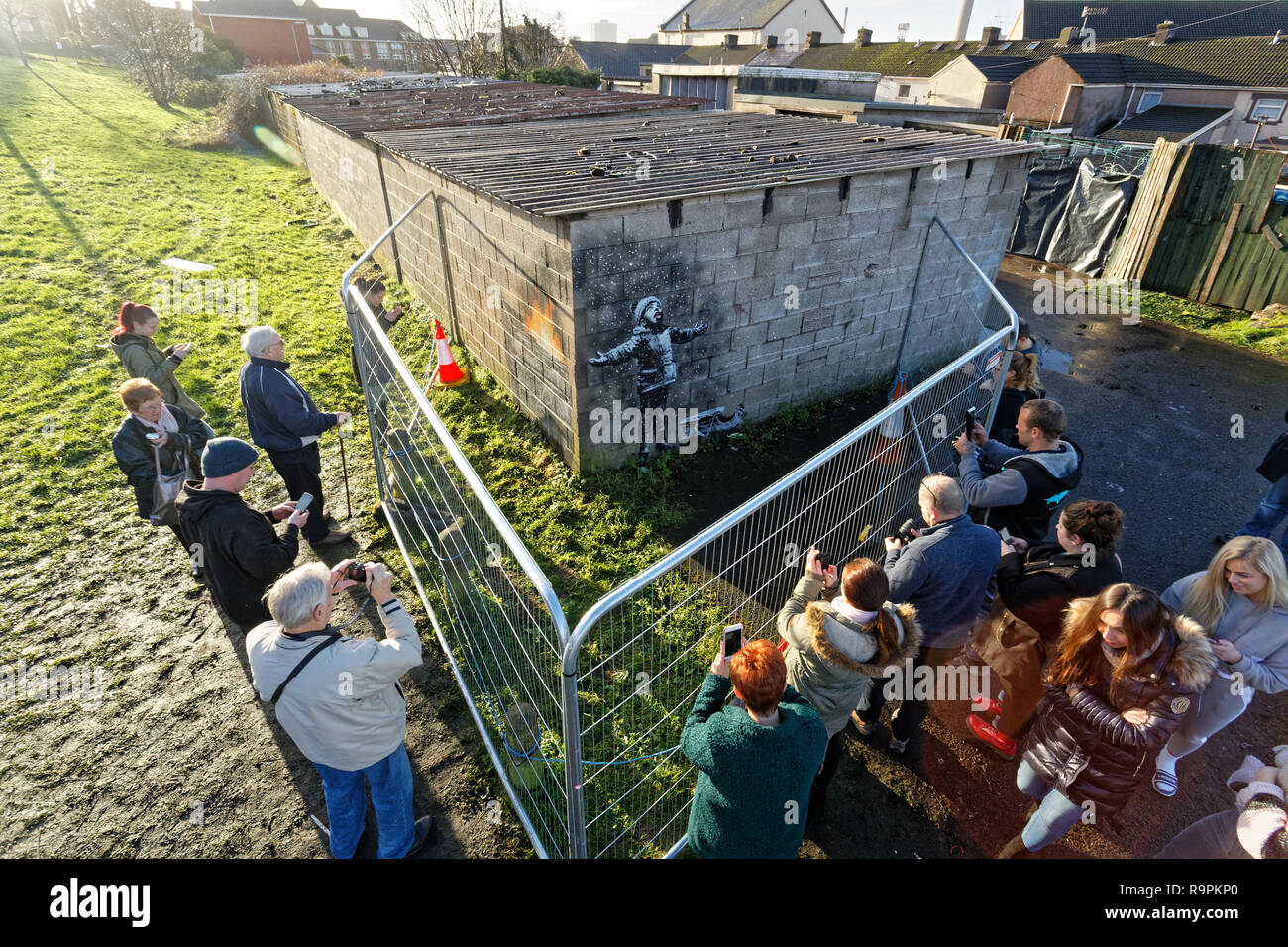 Pictured Crowds Arrive To See And Take Pictures Of The Banksy