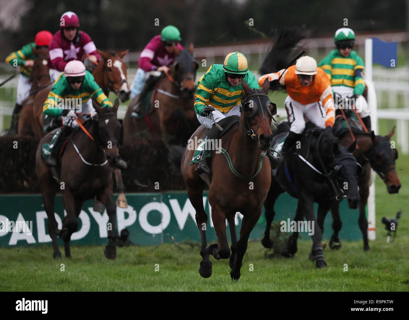 Auvergnat ridden by Donal McInerney (centre) races clear of the last on the way to winning the Paddy Power Steeplechase during day two of the Leopardstown Christmas Festival at Leopardstown Racecourse. Stock Photo