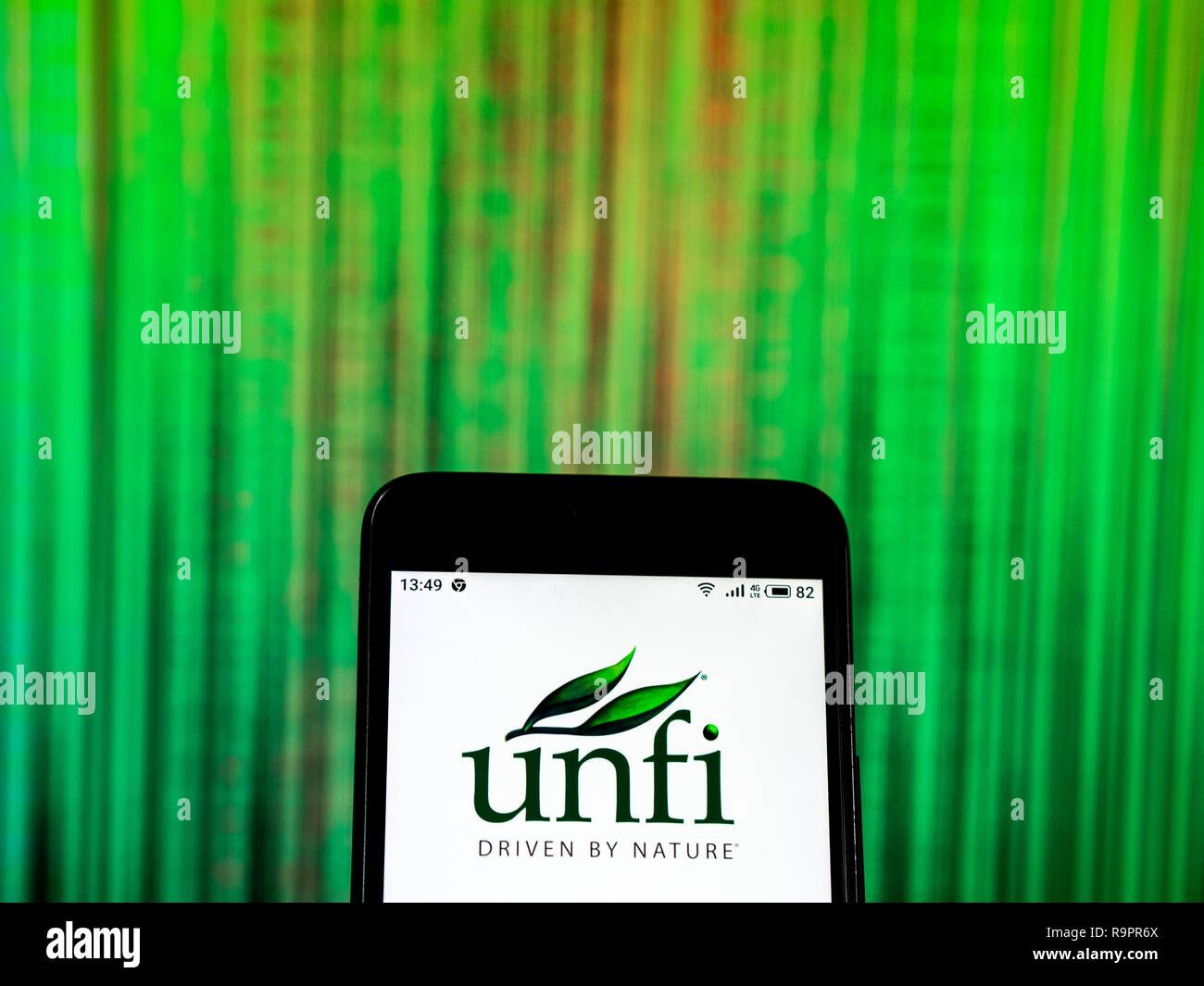 United Natural Foods Grocery store company logo seen displayed on smart