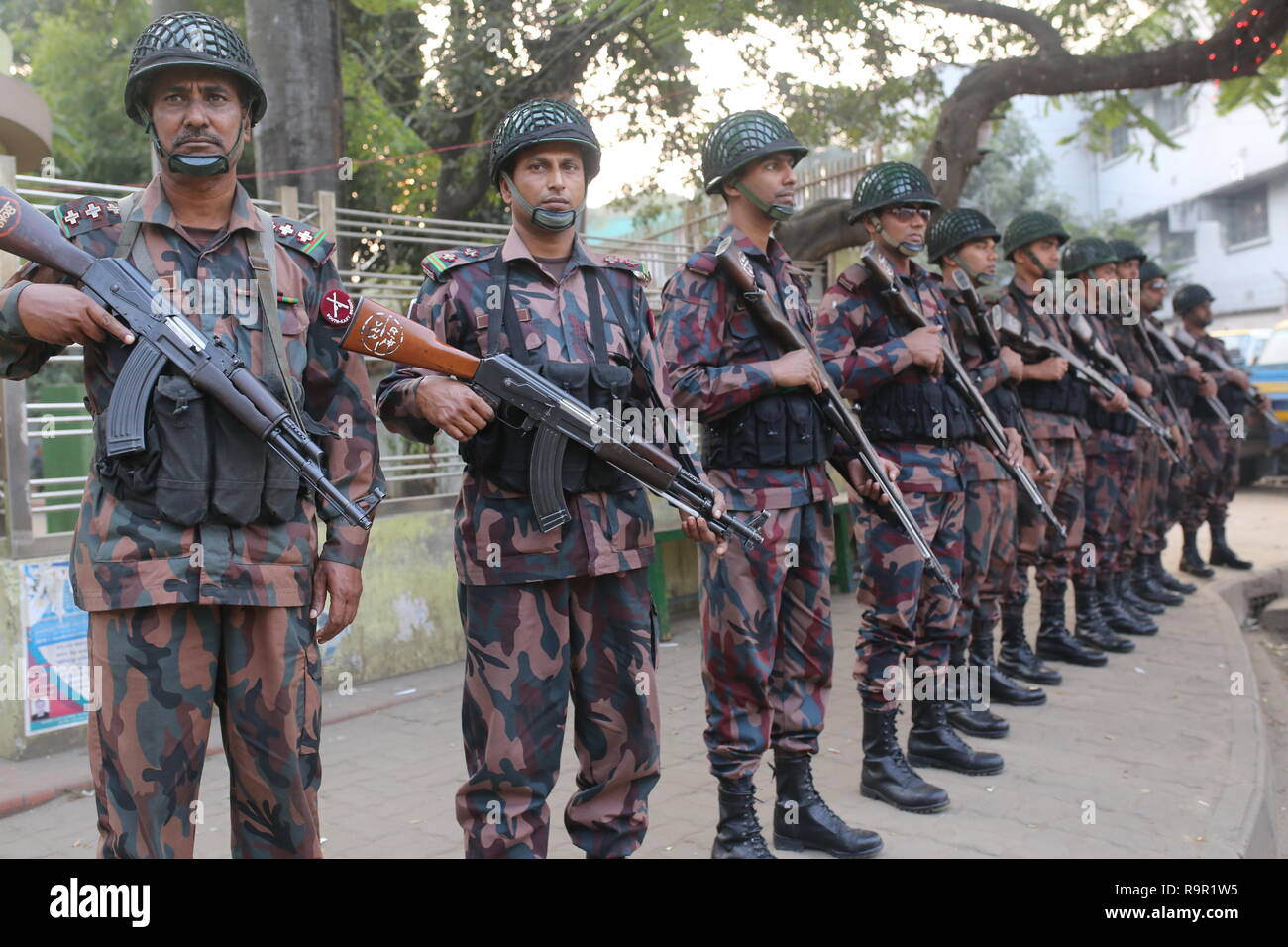 Dhaka, Bangladesh: Members of Border Guard Bangladesh (BGB) stand guard on a street ahead of the general election in Dhaka, Bangladesh on December 26, 2018. More than 100 million people are expected to cast their votes in the upcoming general election which will be held on December 30, 2018. © Rehman Asad / Alamy Stock Photo Stock Photo