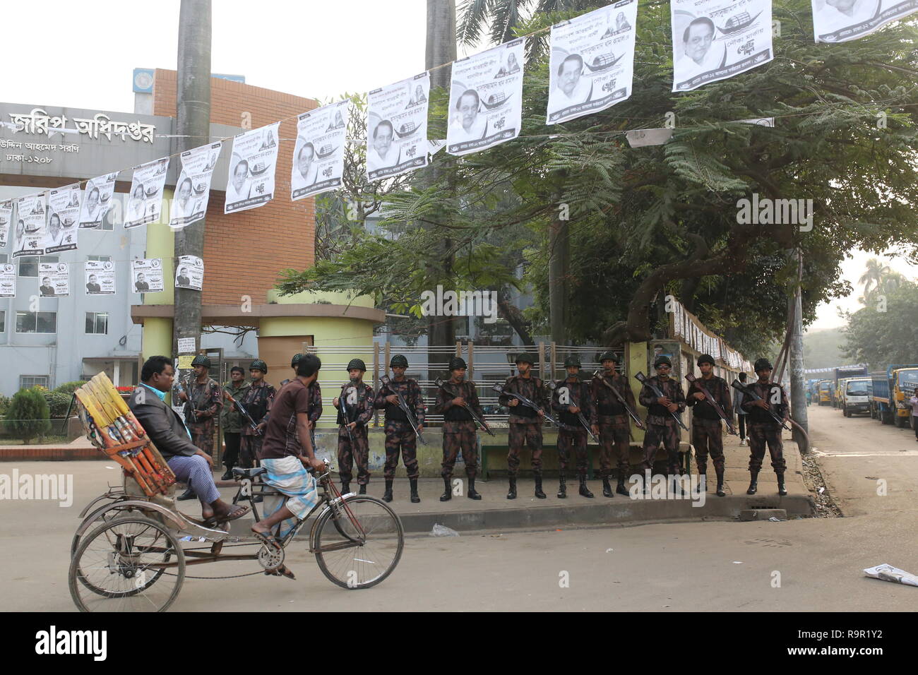 Dhaka, Bangladesh: Members of Border Guard Bangladesh (BGB) stand guard on a street ahead of the general election in Dhaka, Bangladesh on December 26, 2018. More than 100 million people are expected to cast their votes in the upcoming general election which will be held on December 30, 2018. © Rehman Asad / Alamy Stock Photo Stock Photo