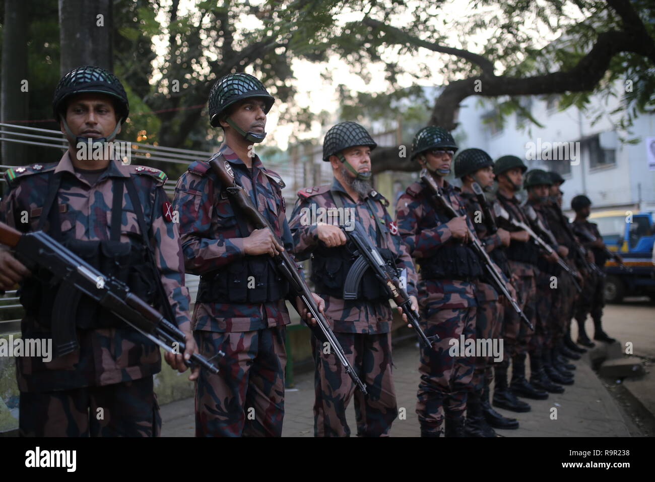 Dhaka, Bangladesh: Members of Border Guard Bangladesh (BGB) stand guard on a street ahead of the general election in Dhaka, Bangladesh on December 26, 2018. More than 100 million people are expected to cast their votes in the upcoming general election which will be held on December 30, 2018. © Rehman Asad / Alamy Stock Photo Stock Photo