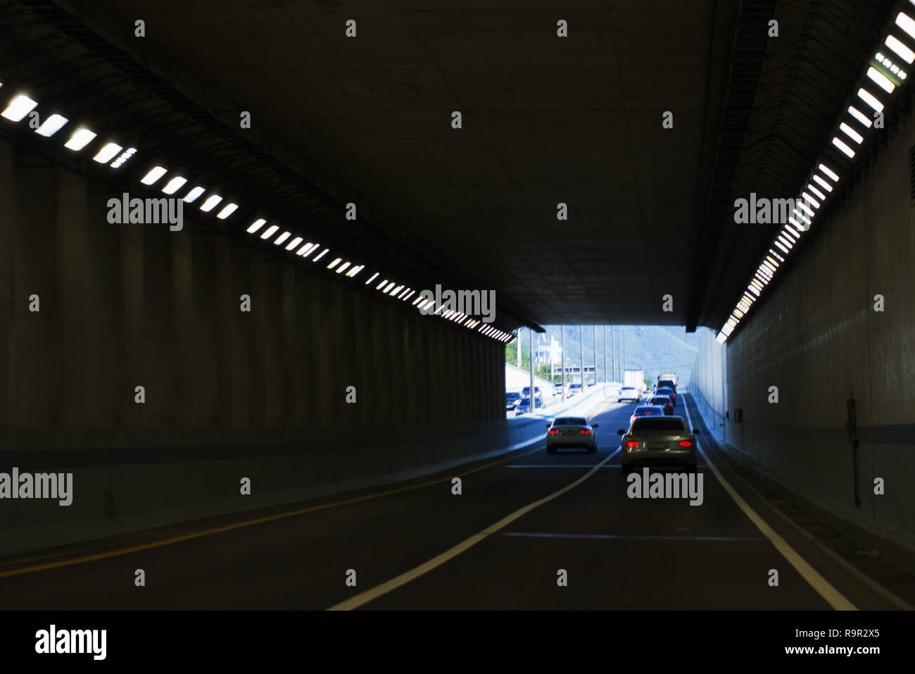 a scene of light and exit of a tunnel Stock Photo