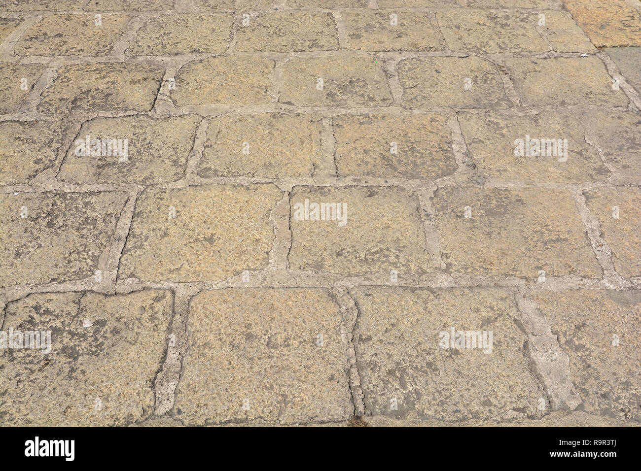 Abstract background of old cobblestone pavement close-up Stock Photo ...