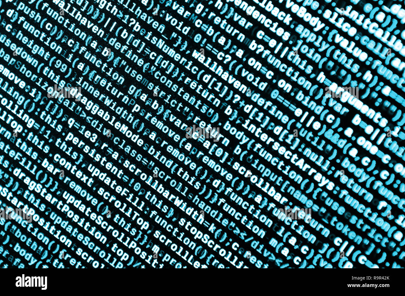 Writing programming code on laptop. Digital binary data on computer ...