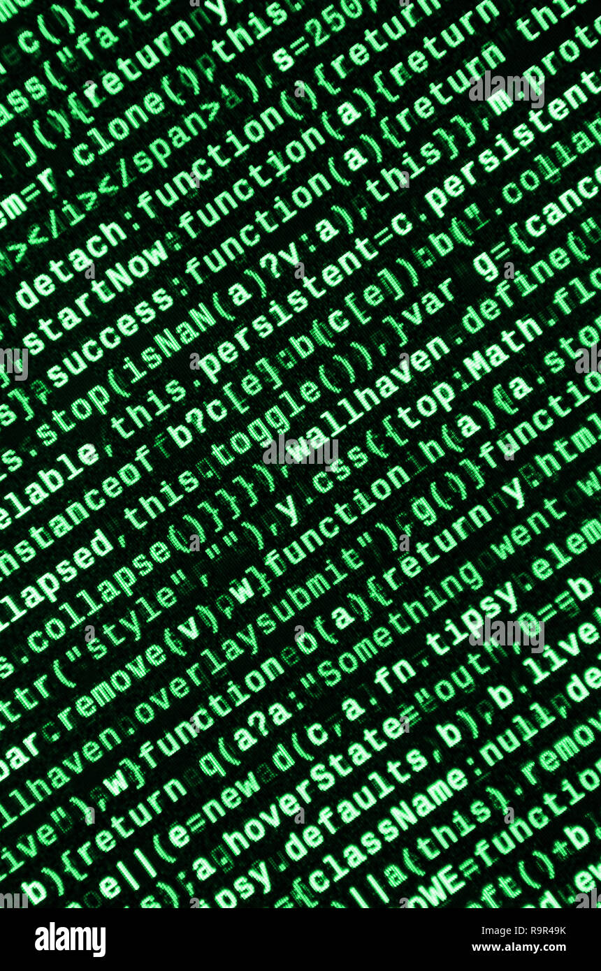 Writing programming code on laptop. Digital binary data on computer ...