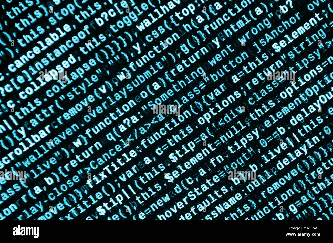 Writing programming code on laptop. Digital binary data on computer ...