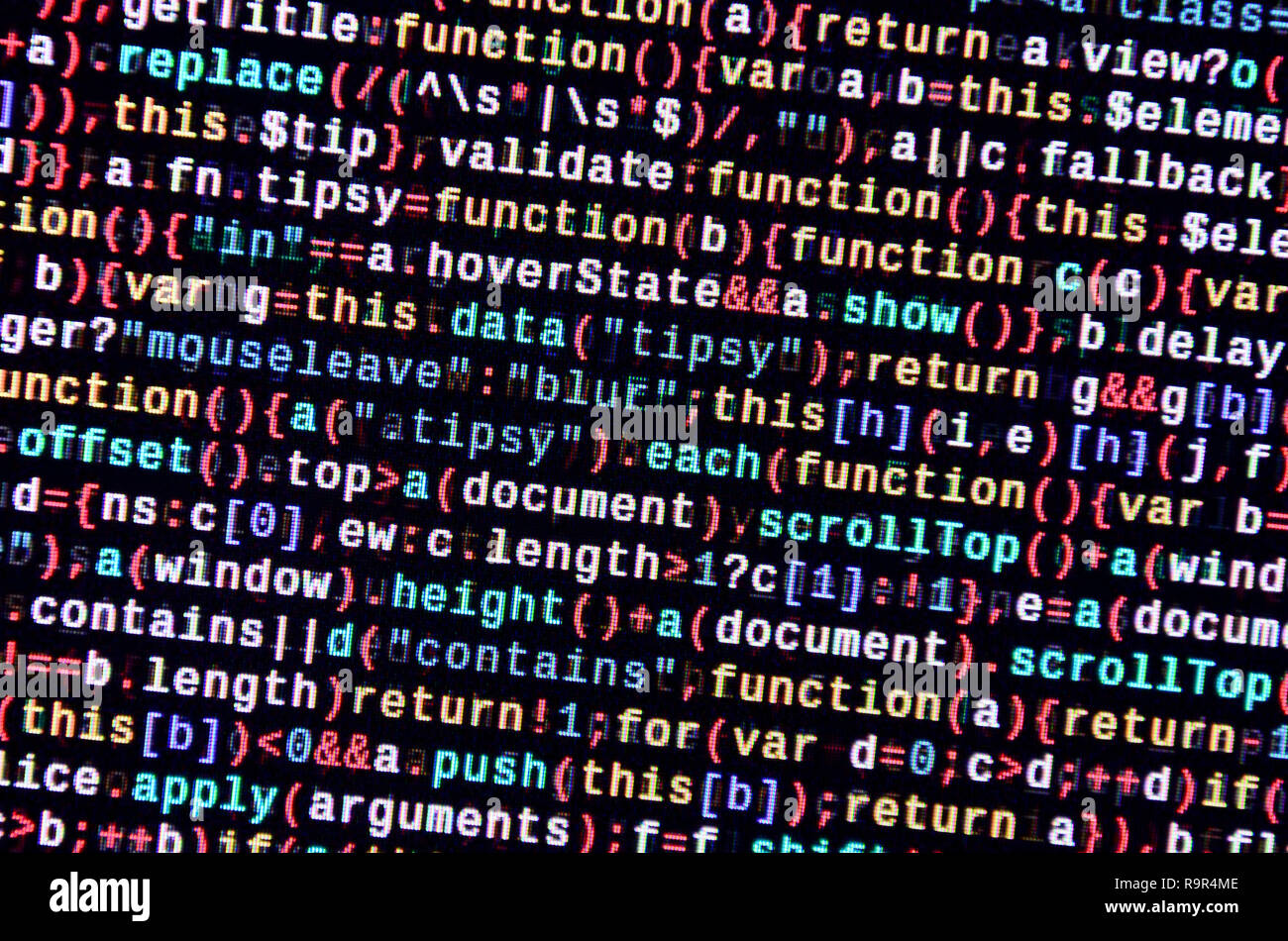 Writing programming code on laptop. Digital binary data on computer ...