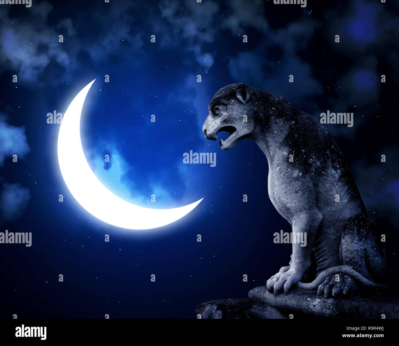 Ancient stone lion statue and crescent. On night sky background with stars and clouds Stock