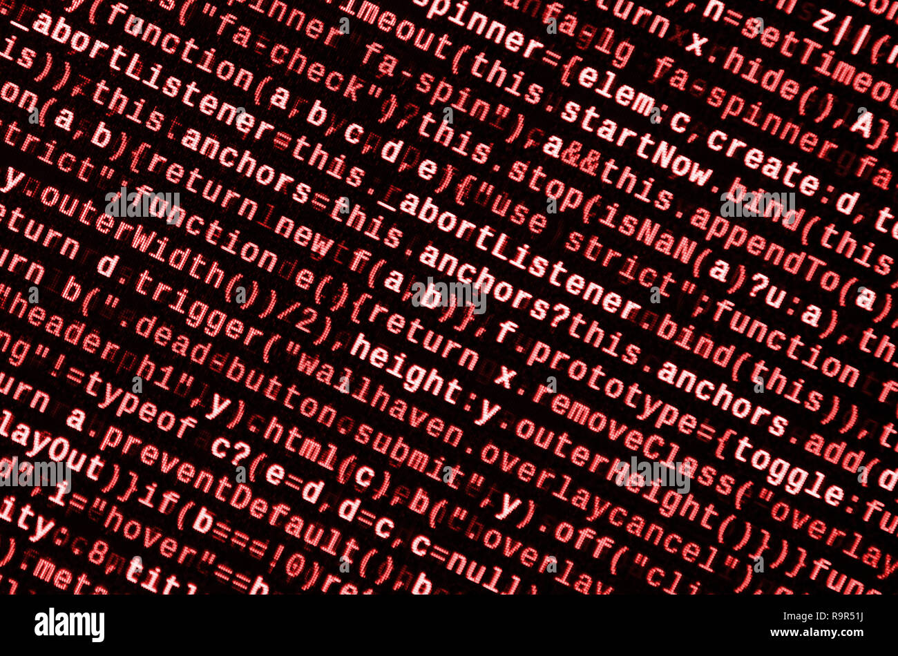 Writing programming code on laptop. Digital binary data on computer ...