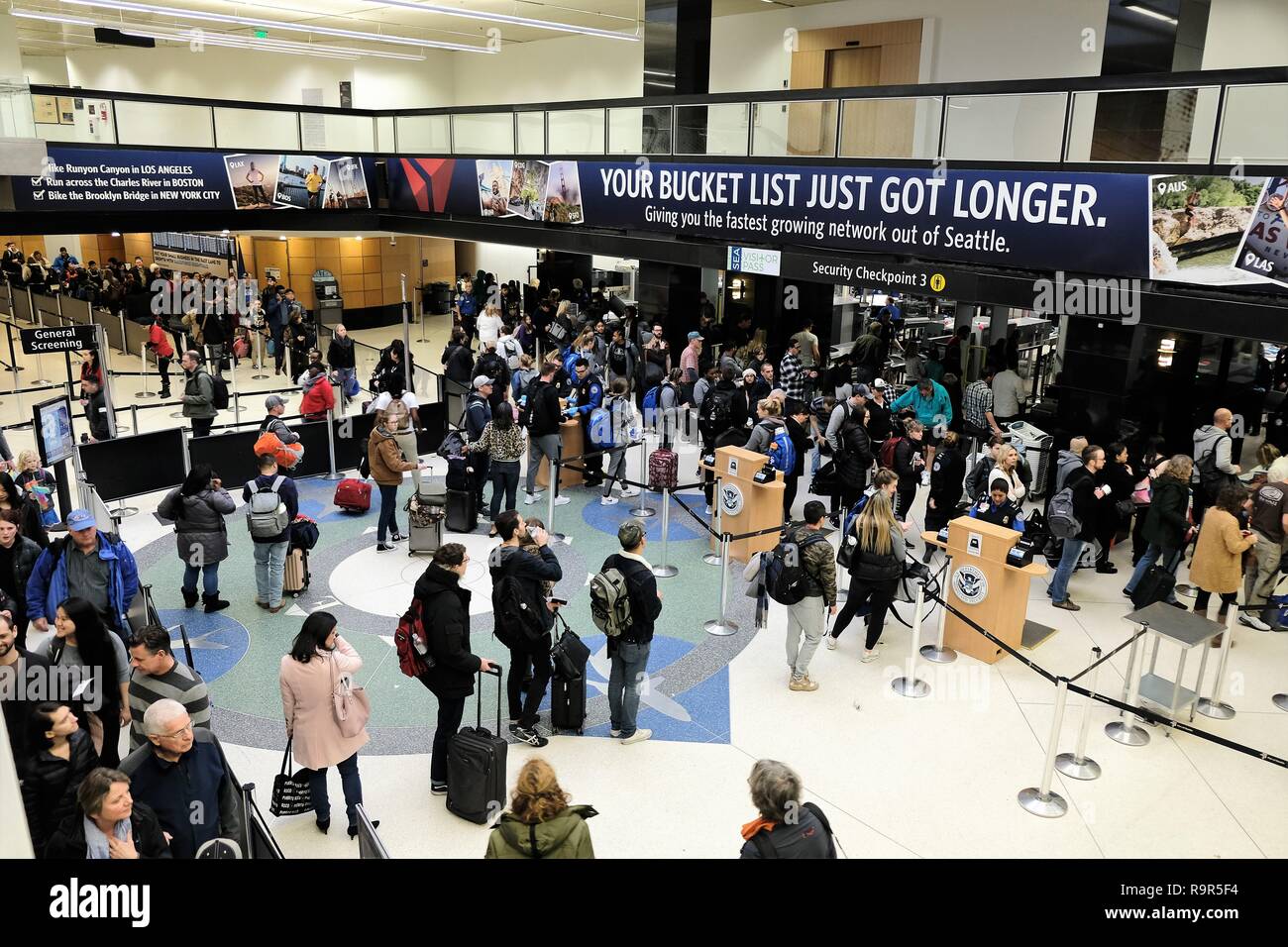 Passengers in line to go through TSA security checkpoint at Seattle–Tacoma International Airport in Seattle, Washington, USA. Stock Photo