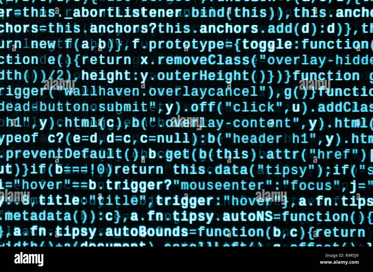 Writing programming code on laptop. Digital binary data on computer ...