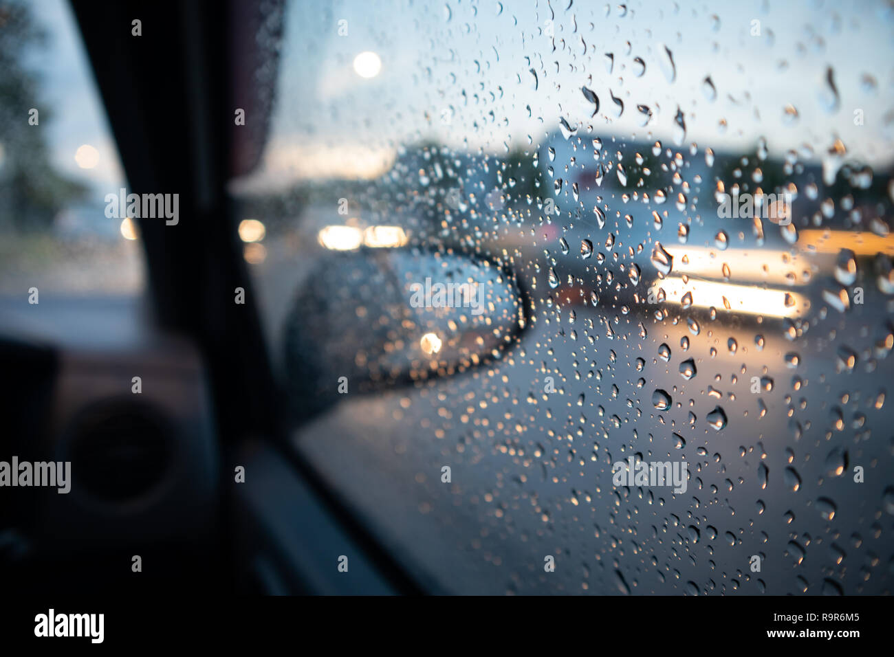 Rain drop on the window with light trail Stock Photo - Alamy