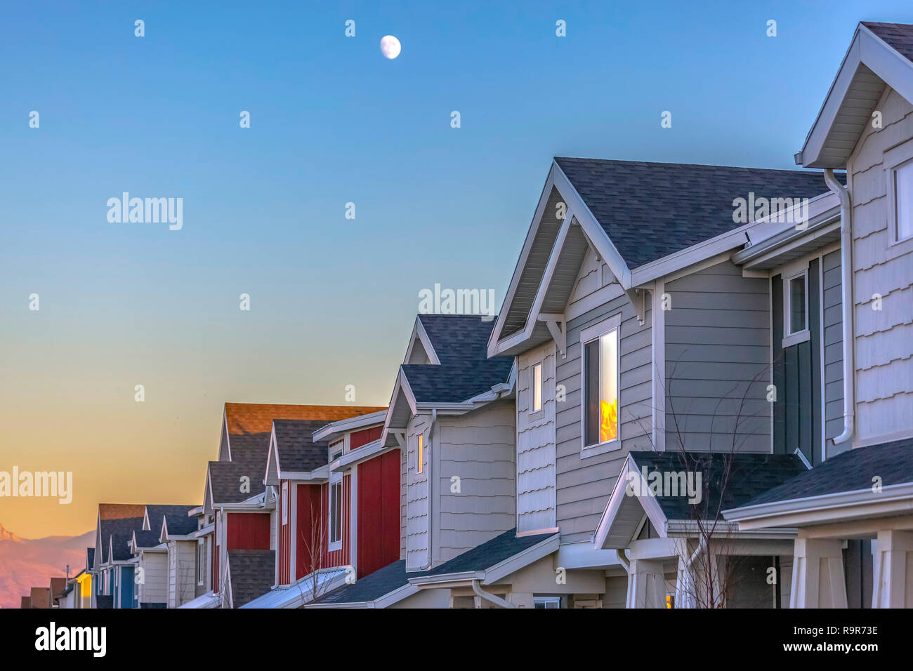Moon above Townhomes at sunset in Utah Valley Stock Photo Alamy