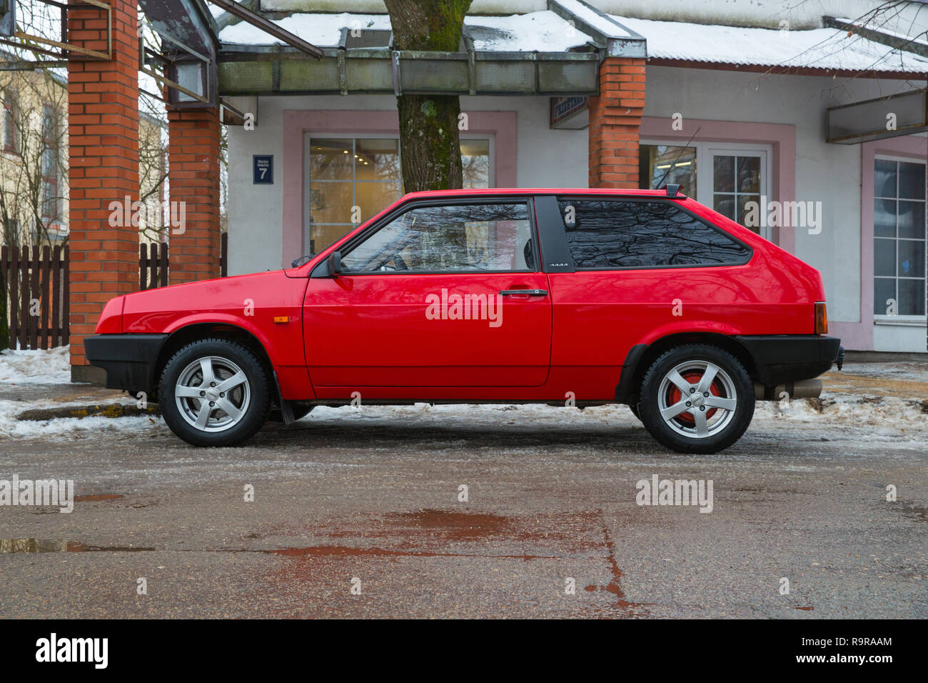 City Cesis, Latvia. Red Lada Samara, old made in USSR car at street. Urban travel photo 2018, december. Stock Photo