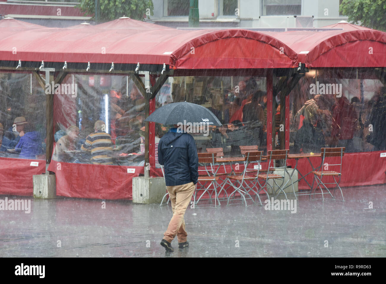People in a rain storm, Bergen, Norway Stock Photo Alamy