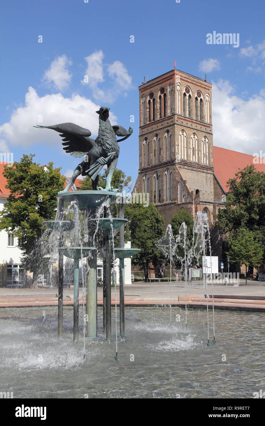 Market place in Anklam with Griffin-fountain and Church of St. Nicholas Stock Photo