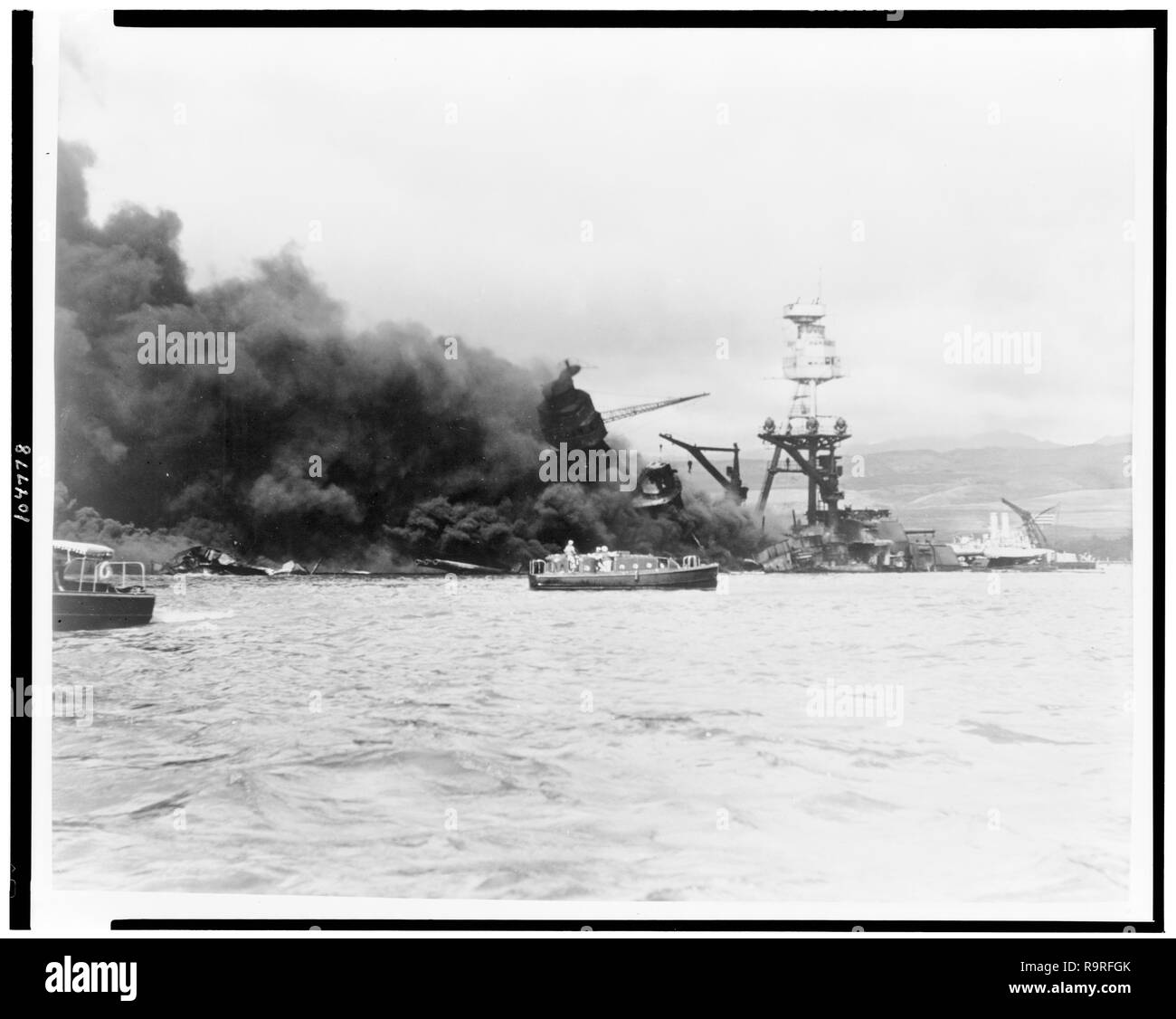 USS Arizona, at height of fire, following Japanese aerial attack on Pearl Harbor, Hawaii, December 7, 1941. (Library of Congress-Farm Security Administration - Office of War Information) Stock Photo