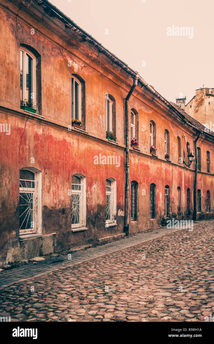 Narrow street and buildings in old town, Vilnius, Lithuania. Stock Photo