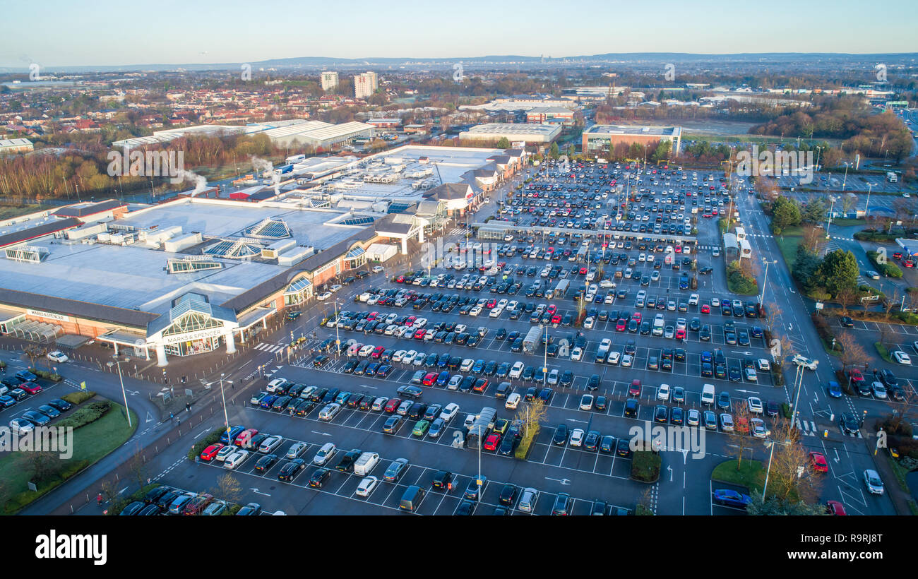 Picture dated December 24th shows the car park almost full at 9AM on Christmas Eve morning at the Marks and Spencer and Tesco stores near Wilmslow in Cheshire as people do their last minute Christmas shopping causing traffic delays in the area. Stock Photo