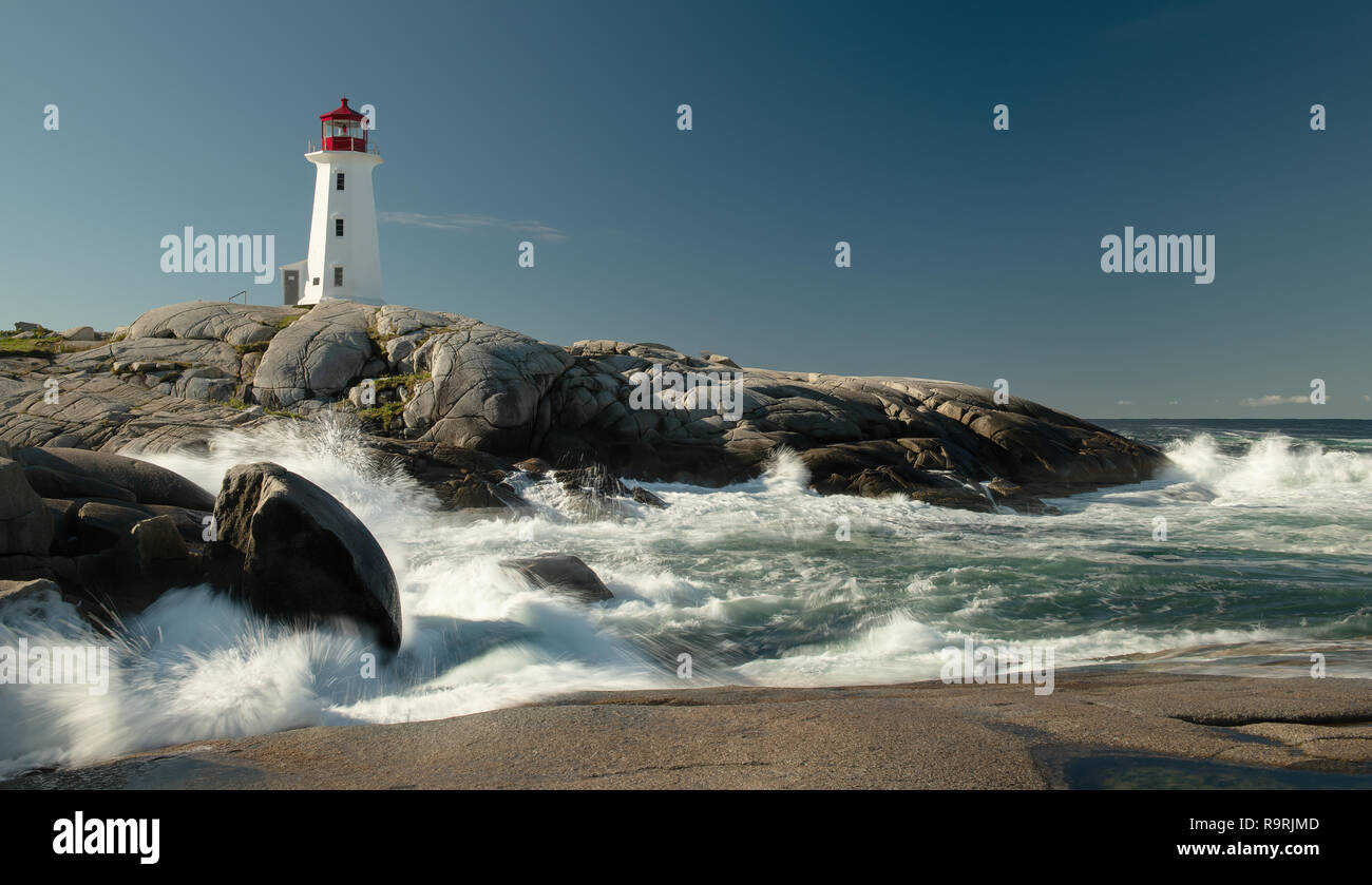 Peggys Cove Lighthouse with waves Stock Photo Alamy