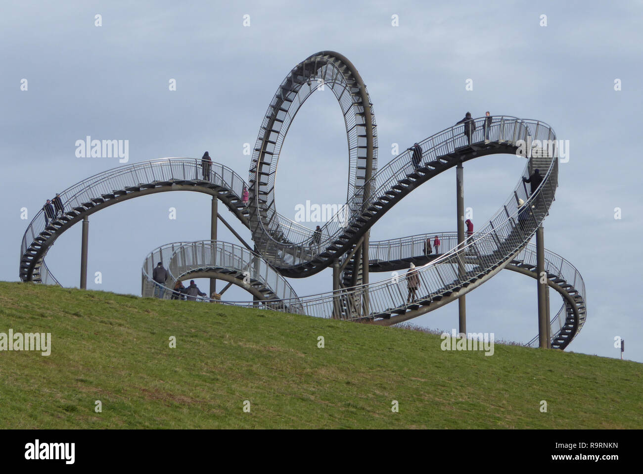 December 27, 2018 - Duisburg, North Rhine-Westphalia, Germany - People can  be seen walking on the 'Tiger and Turtle ""“ Magic Mountain' art  installation in Angerpark, Duisburg, Germany. Designed by ULRICH GENTH