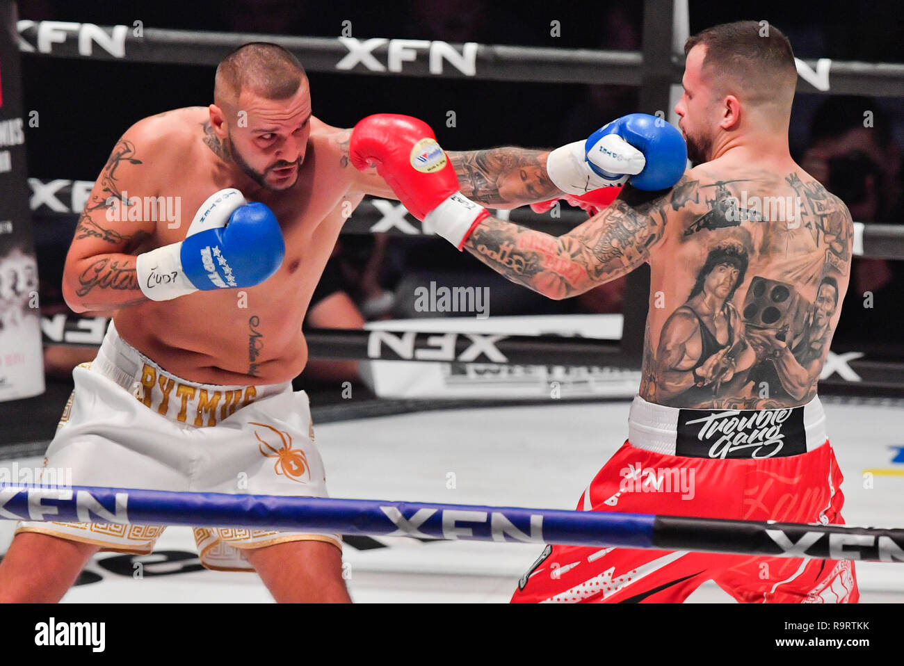 Prague, Czech Republic. 27th Dec, 2018. Slovak rapper Patrik Vrbovsky alias  Rytmus, left, and Czech rapper Otakar Petrina alias Marpo fight during a  MMA gala evening in Prague, Czech Republic, on December