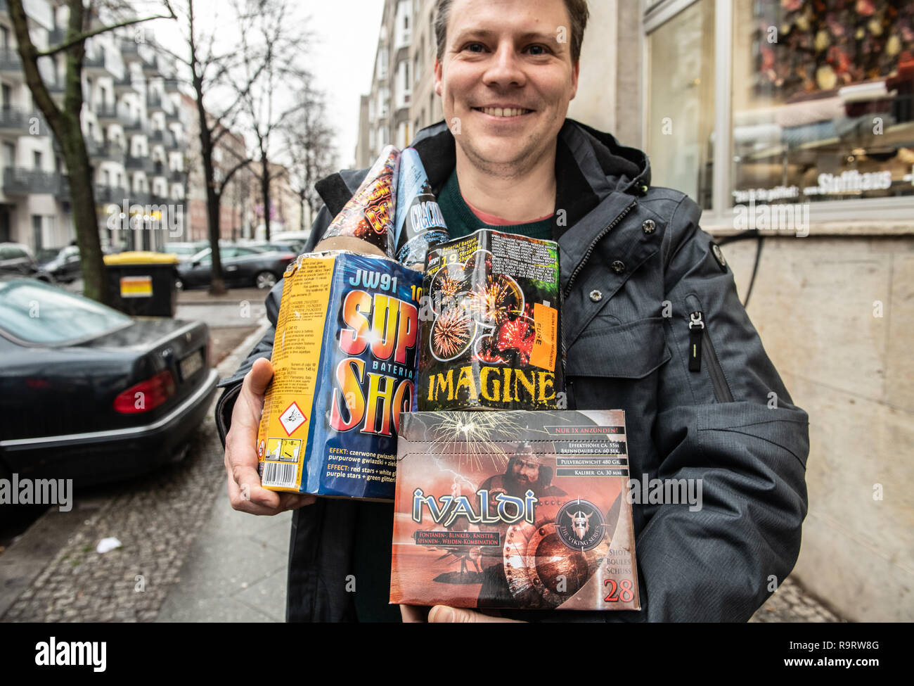 Berlin, Germany. 28th Dec, 2018. Marcus Rätzel from Berlin shows a part of the New Year's Eve pyrotechnics he bought in a shop in Friedrichshain. Together with his family he will shoot the rockets and batteries into the sky on New Year's Eve. Credit: Paul Zinken/dpa/Alamy Live News Stock Photo