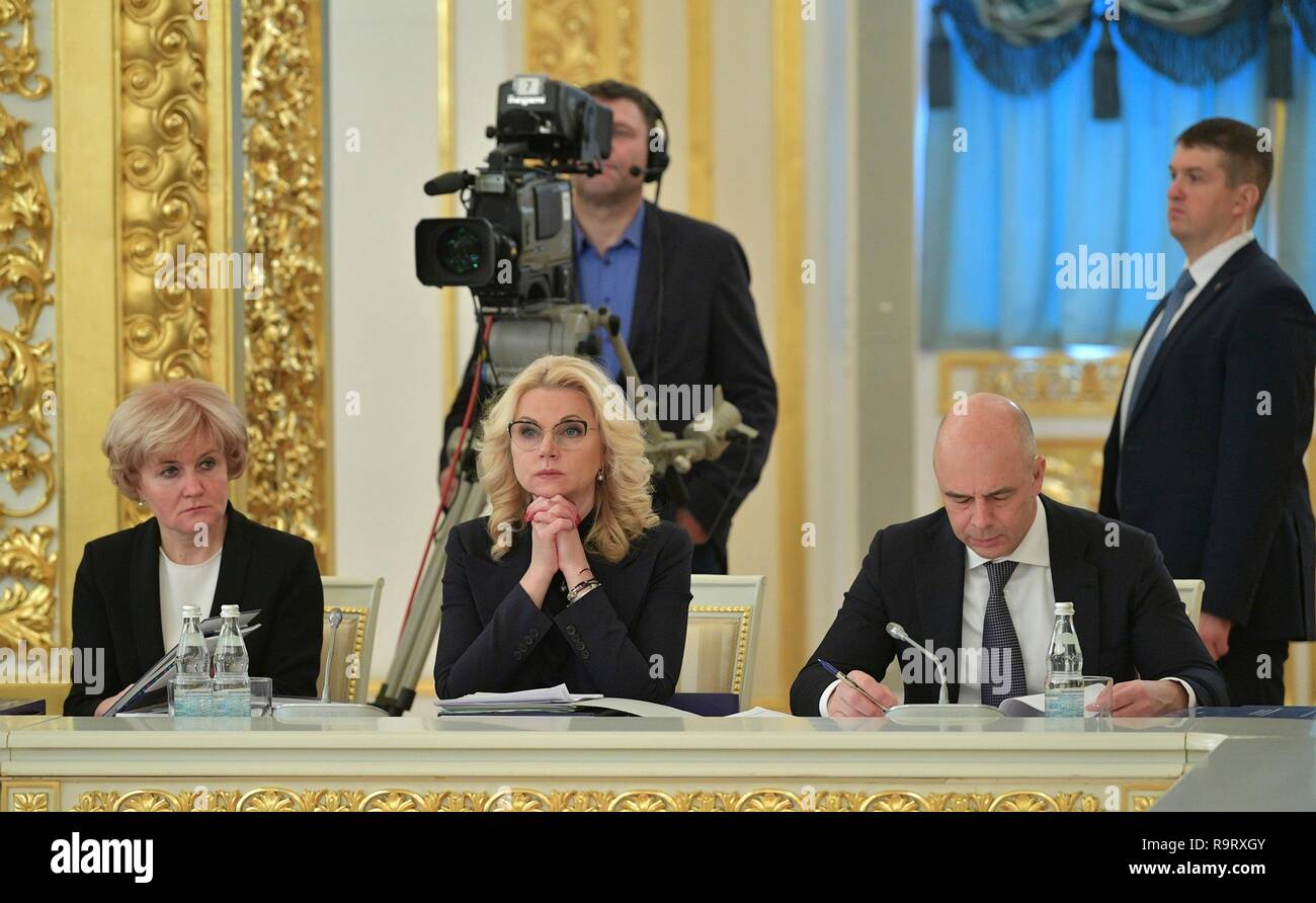 Russian Deputy Prime Minister Olga Golodets, left, Deputy Prime Minister Tatyana Golikova and Finance Minister Anton Siluanov, right, during a State Council meeting on the development of the volunter movement and non-profit organizations at the Kremlin December 27, 2018 in Moscow, Russia. Stock Photo