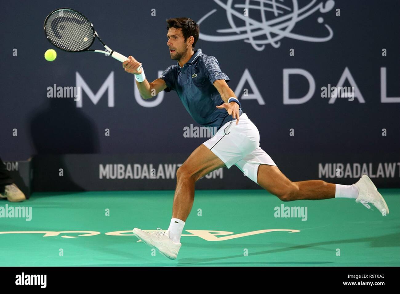 Abu Dhabi, United Arab Emirates (UAE). 28th Dec, 2018. Novak Djokovic of Serbia returns to Karen Khachanov of Russia during the 2018 Mubadala World Tennis Championship in Abu Dhabi, the United Arab Emirates (UAE), on Dec. 28, 2018. Novak Djokovic won 2-0. Credit: Mahmoud Khaled/Xinhua/Alamy Live News Stock Photo