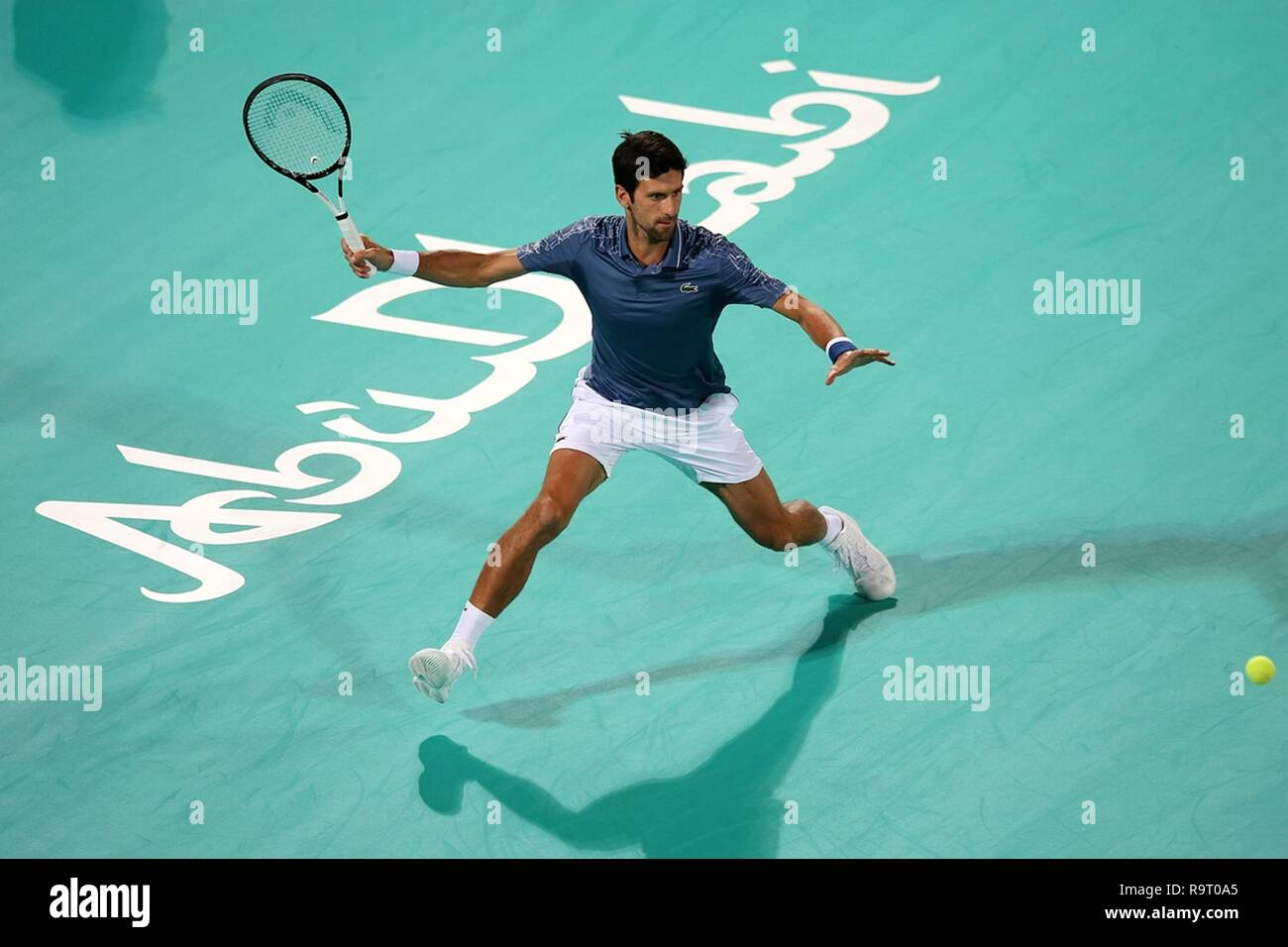 Abu Dhabi, United Arab Emirates (UAE). 28th Dec, 2018. Novak Djokovic of Serbia returns to Karen Khachanov of Russia during the 2018 Mubadala World Tennis Championship in Abu Dhabi, the United Arab Emirates (UAE), on Dec. 28, 2018. Novak Djokovic won 2-0. Credit: Mahmoud Khaled/Xinhua/Alamy Live News Stock Photo