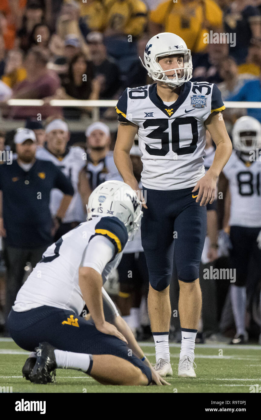Orlando, FL, USA. 28th Dec, 2018. West Virginia Mountaineers place kicker Evan Staley (30) prepares to kick a 28 yd field goal during the Camping World Bowl between West Virginia Mountaineers and the Syracuse Orange at Camping World Stadium in Orlando, Fl. Romeo T Guzman/CSM/Alamy Live News Stock Photo