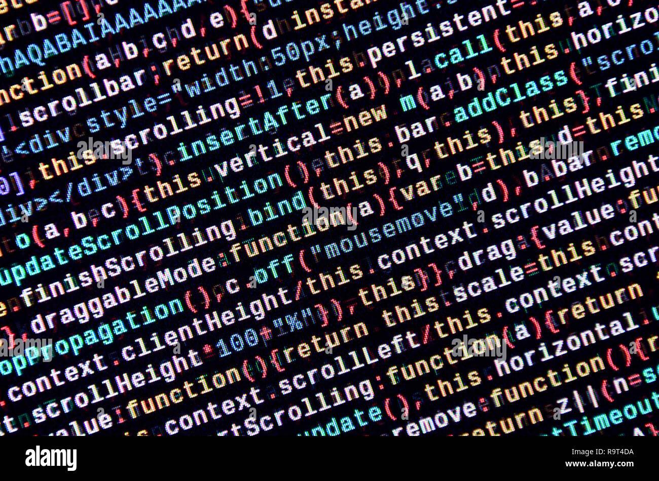 Writing programming code on laptop. Digital binary data on computer ...